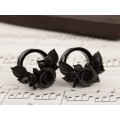Handcrafted black rose ear tunnels for Goth weddings