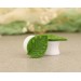 Tunnels and plugs earrings with green leaf