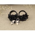 Tunnel earrings for stretched ears with roses and raven skulls