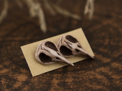 Tiny raven skull stud earrings