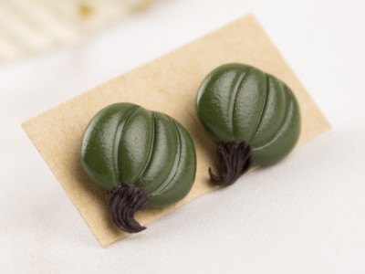 Tiny green pumpkin studs