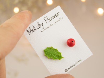Mismatched holly berry and leaf studs Mismatched holly berry and leaf studs